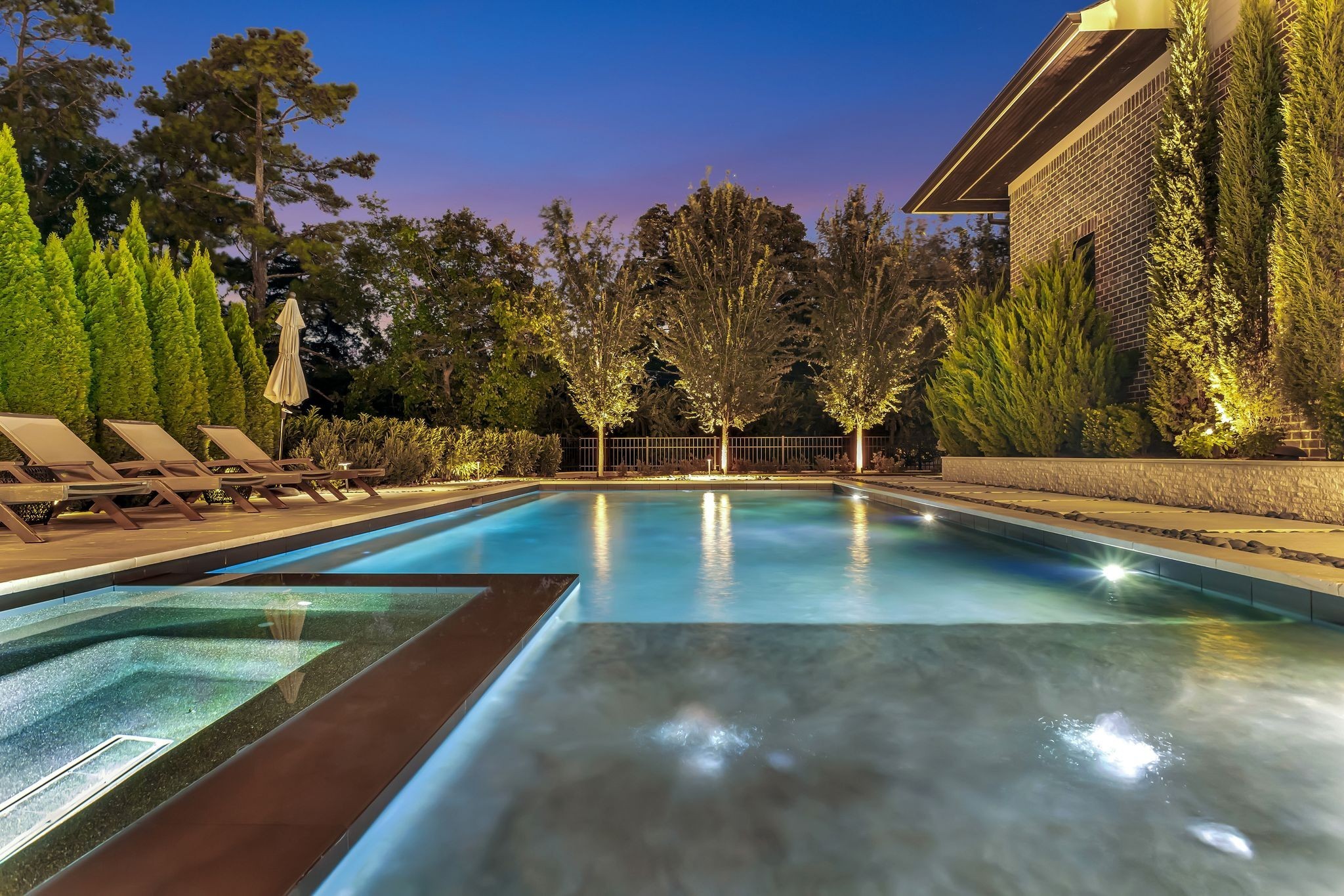 6029 Sedberry Road Nashville, TN 37205 - Photo 2 of 68 a view of a swimming pool with a chair