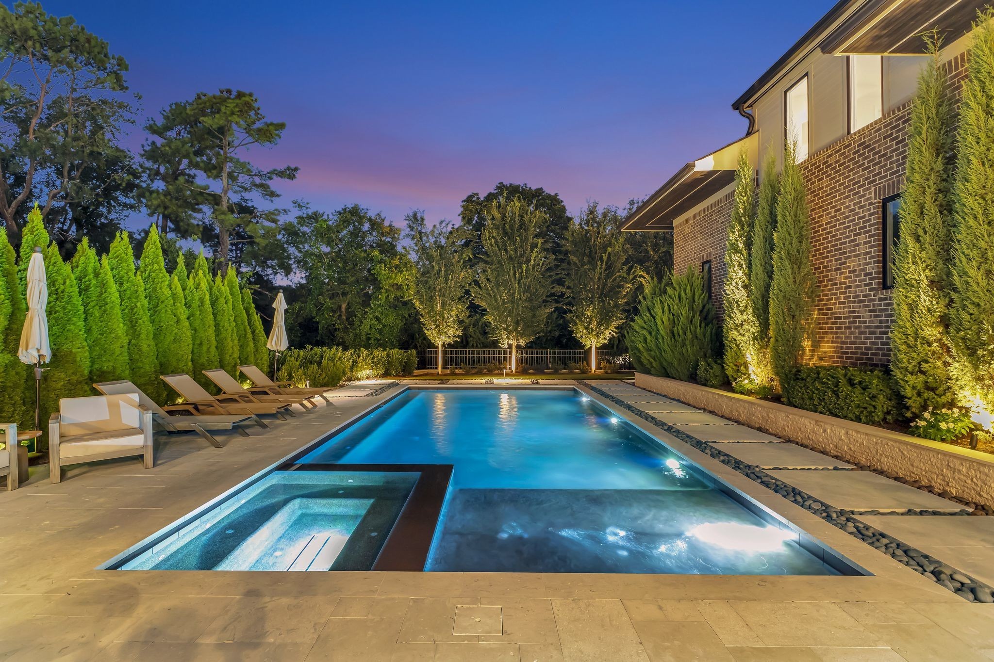 6029 Sedberry Road Nashville, TN 37205 - Photo 3 of 68 a view of swimming pool with seating area and trees in the background