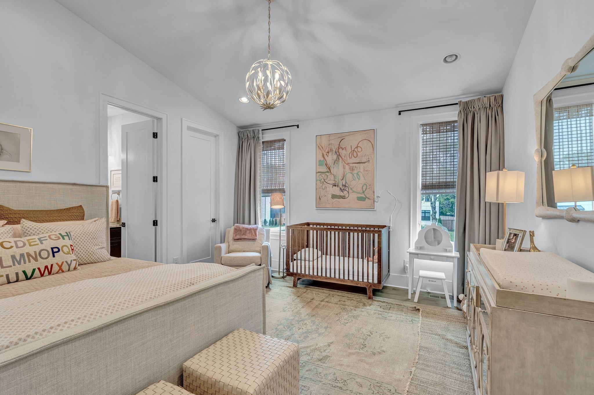 6029 Sedberry Road Nashville, TN 37205 - Photo 34 of 68 a bedroom with a bed and a chandelier