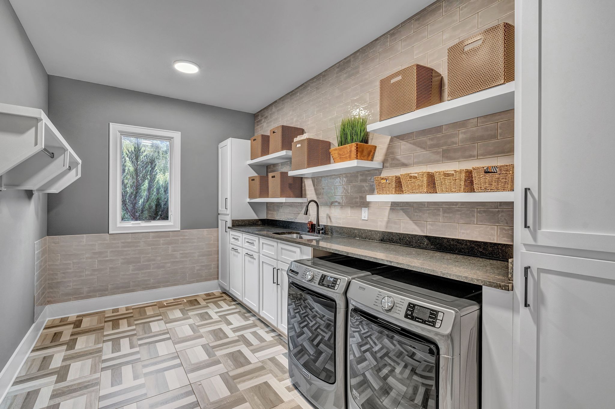 6029 Sedberry Road Nashville, TN 37205 - Photo 37 of 68 a kitchen with stainless steel appliances granite countertop a stove a sink and a microwave