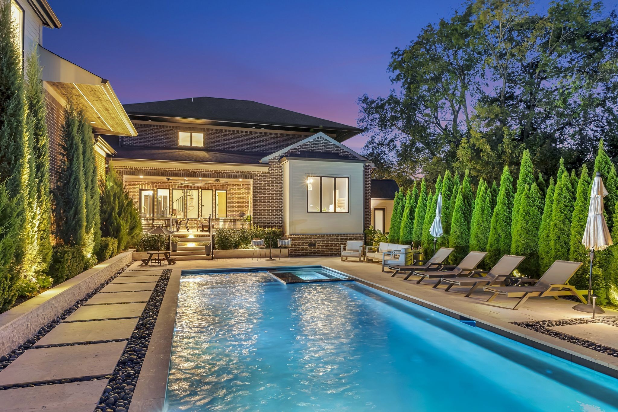 6029 Sedberry Road Nashville, TN 37205 - Photo 4 of 68 a front view of a house with swimming pool