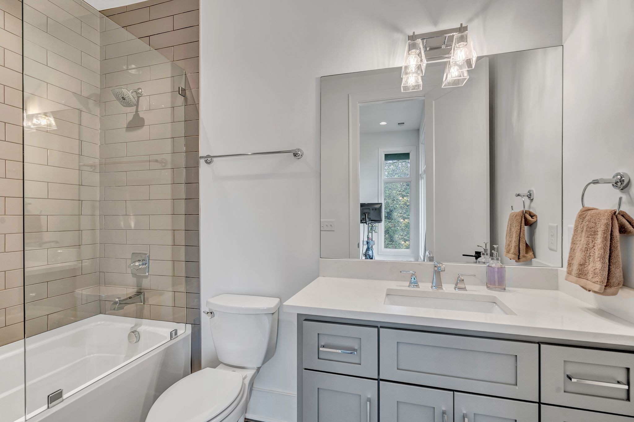 6029 Sedberry Road Nashville, TN 37205 - Photo 49 of 68 a bathroom with a granite countertop sink a toilet and shower