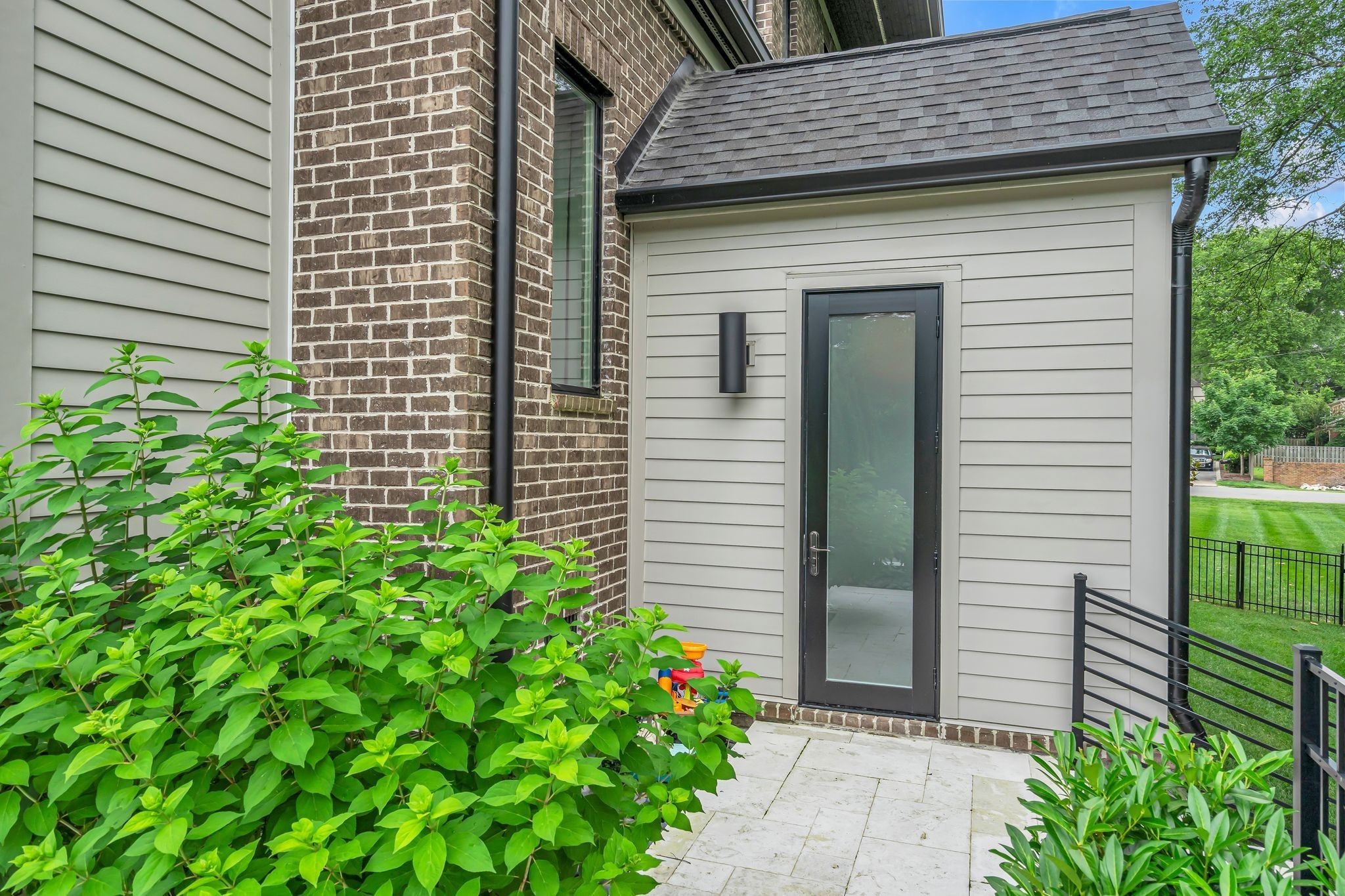 6029 Sedberry Road Nashville, TN 37205 - Photo 58 of 68 a view of a house with a yard and plants