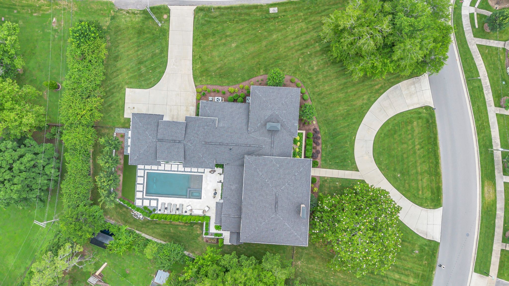 6029 Sedberry Road Nashville, TN 37205 - Photo 62 of 68 an aerial view of a house with outdoor space and trees all around
