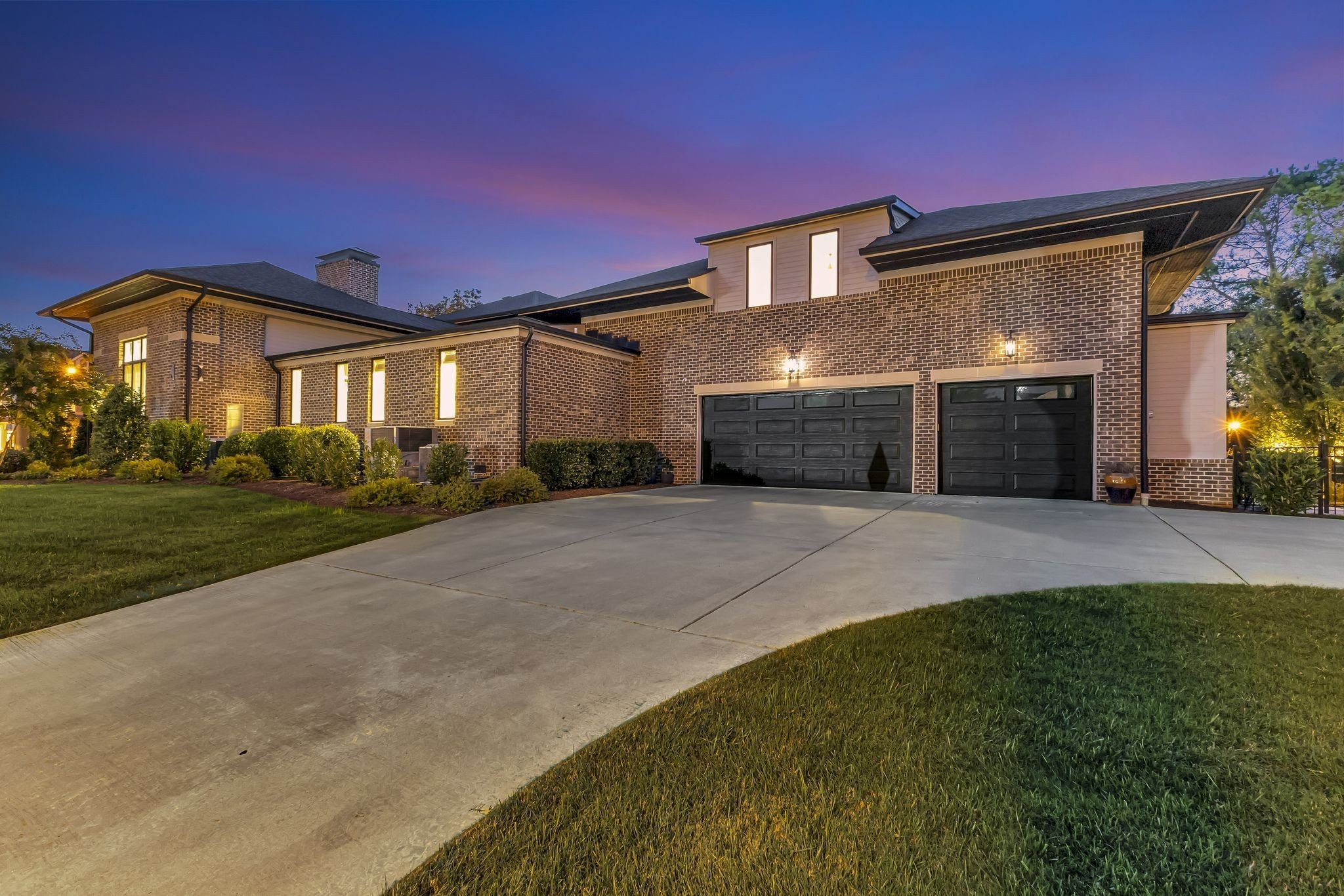 6029 Sedberry Road Nashville, TN 37205 - Photo 68 of 68 a front view of a house with a yard and garage