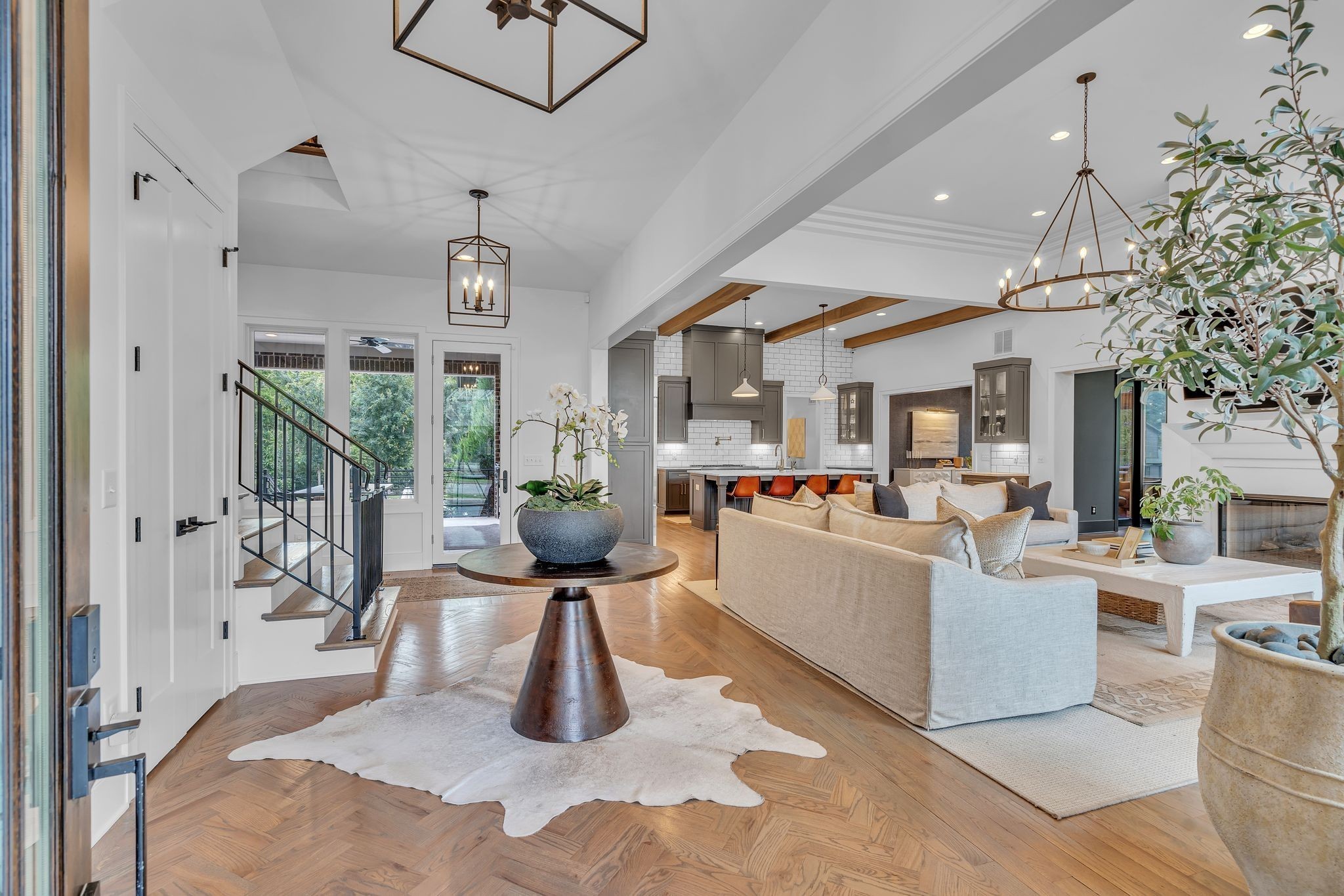 6029 Sedberry Road Nashville, TN 37205 - Photo 9 of 68 a living room with furniture a chandelier and a large window