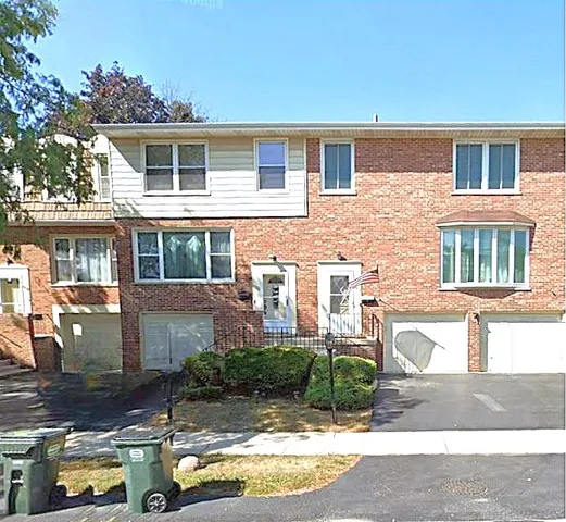 front view of house with a yard