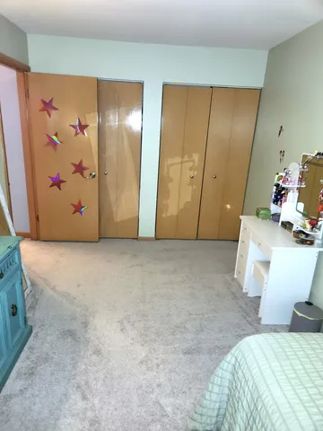 a view of livingroom with furniture and toys