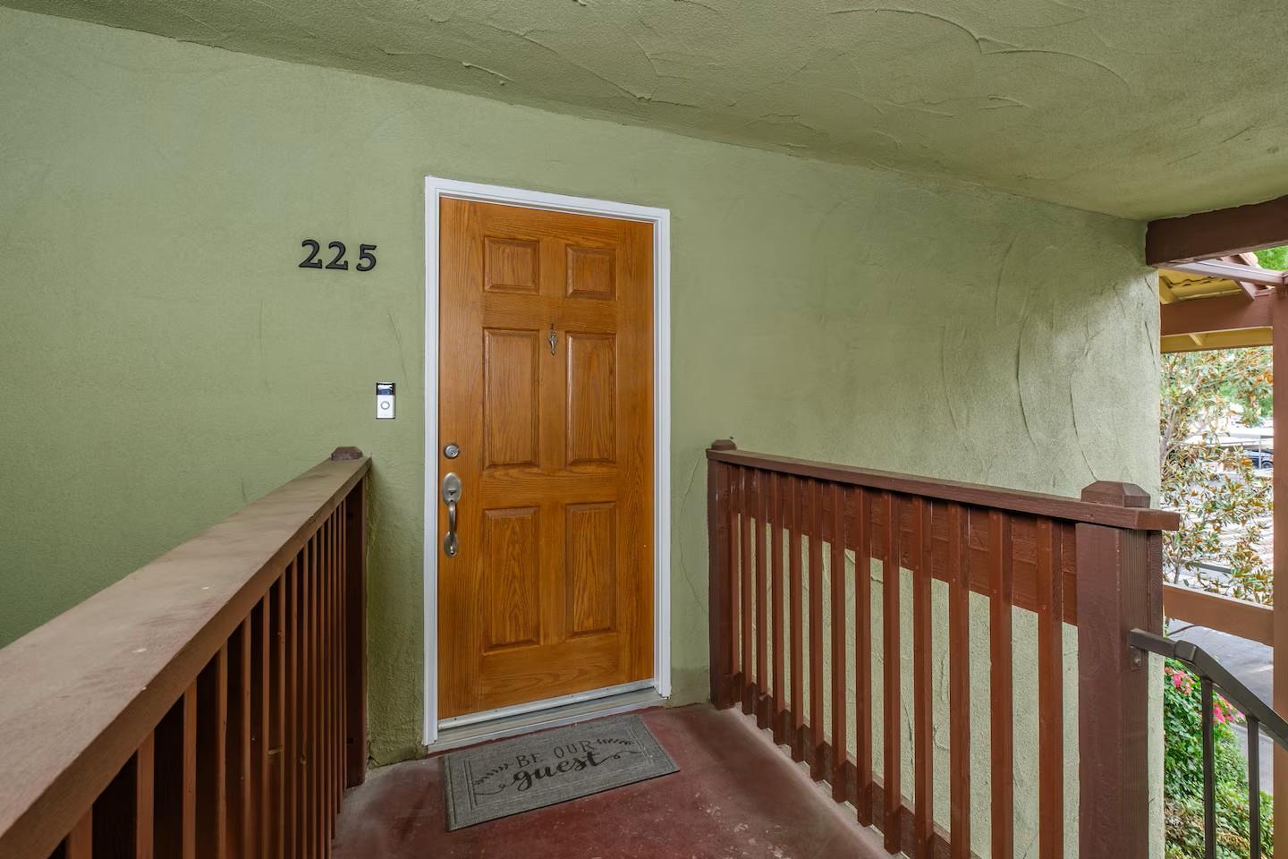 2881 Huntington Boulevard, Unit 225 Fresno, CA 93721 - Photo 11 of 16 a view of a porch with wooden floor