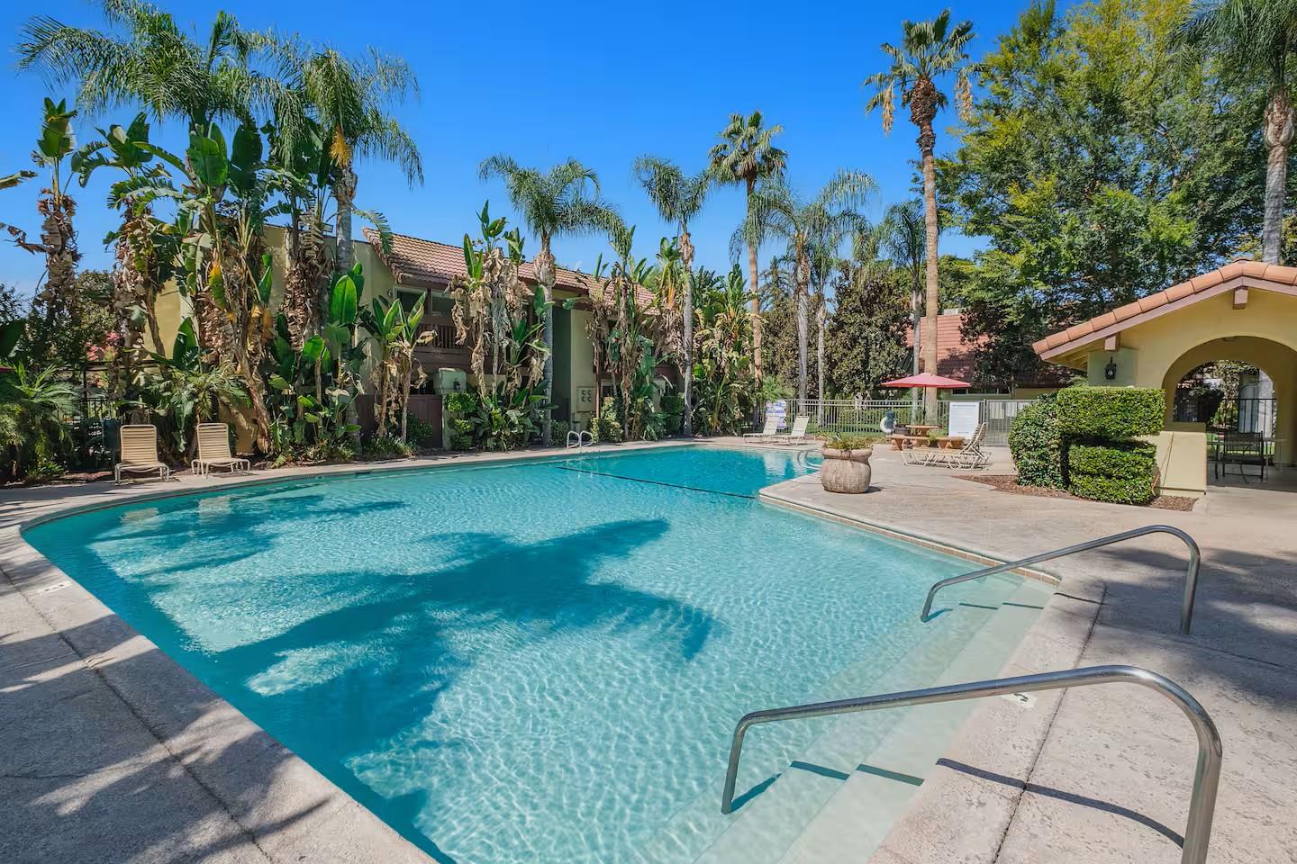2881 Huntington Boulevard, Unit 225 Fresno, CA 93721 - Photo 13 of 16 a view of a house with a yard