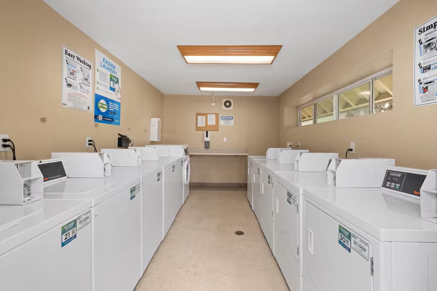 2881 Huntington Boulevard, Unit 225 Fresno, CA 93721 - Photo 16 of 16 a utility room with cabinets