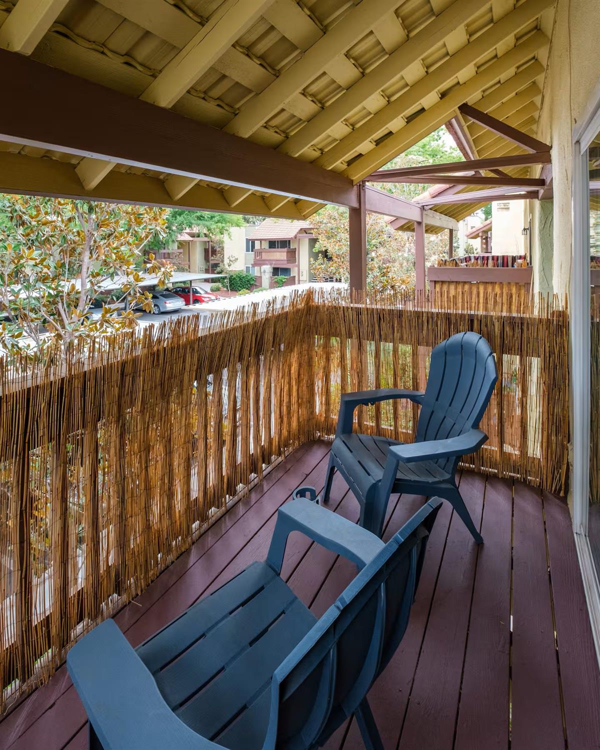 2881 Huntington Boulevard, Unit 225 Fresno, CA 93721 - Photo 9 of 16 a balcony with wooden floor