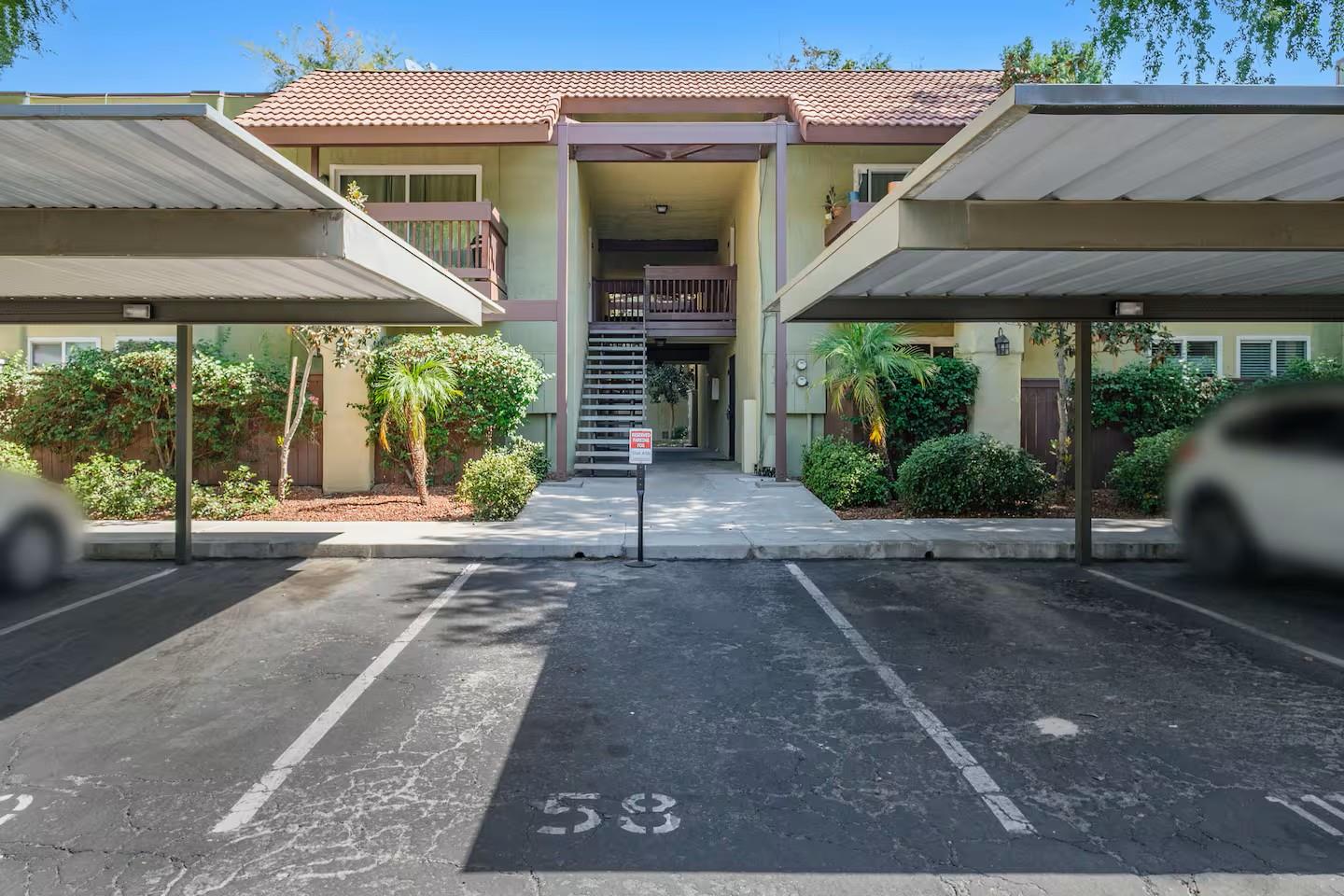 2881 Huntington Boulevard, Unit 225 Fresno, CA 93721 - Photo 10 of 16 a view of a house with a porch