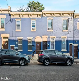 a car parked in front of a house