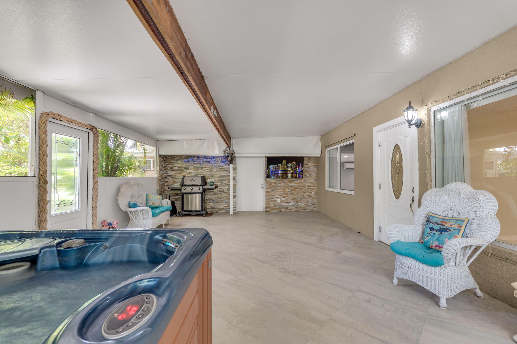 a living room with furniture and a window