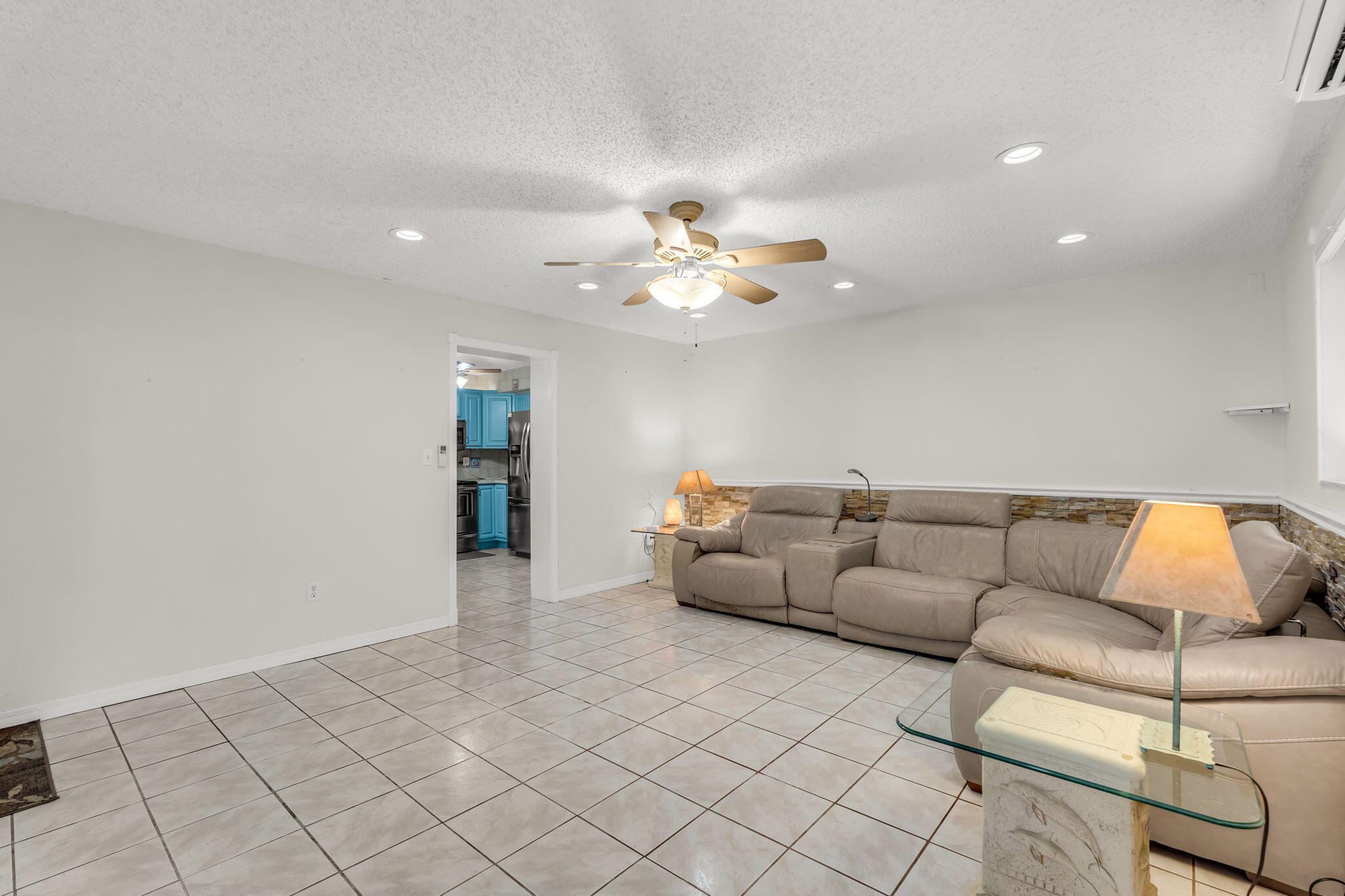 335 Sound Drive Key Largo, FL 33037 - Photo 14 of 45 a living room with furniture and a chandelier