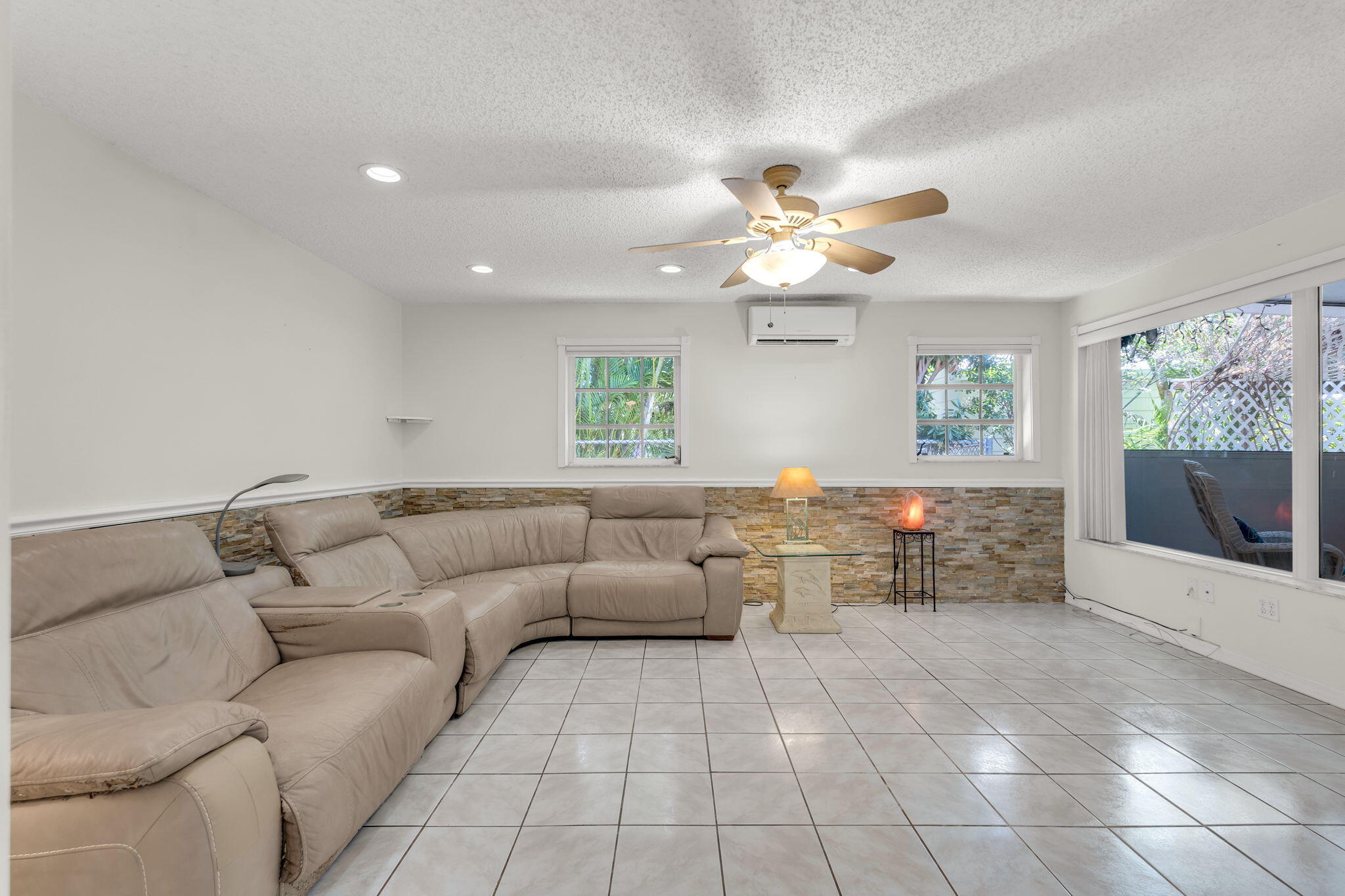335 Sound Drive Key Largo, FL 33037 - Photo 15 of 45 a living room with furniture and a large window