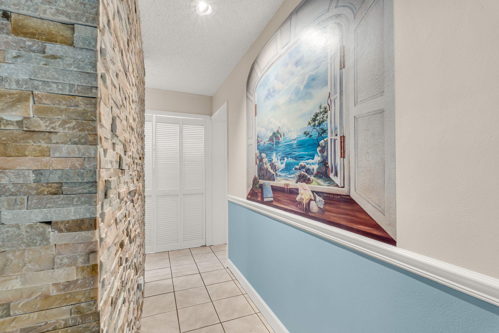 335 Sound Drive Key Largo, FL 33037 - Photo 17 of 45 a room with a mirror and a shower