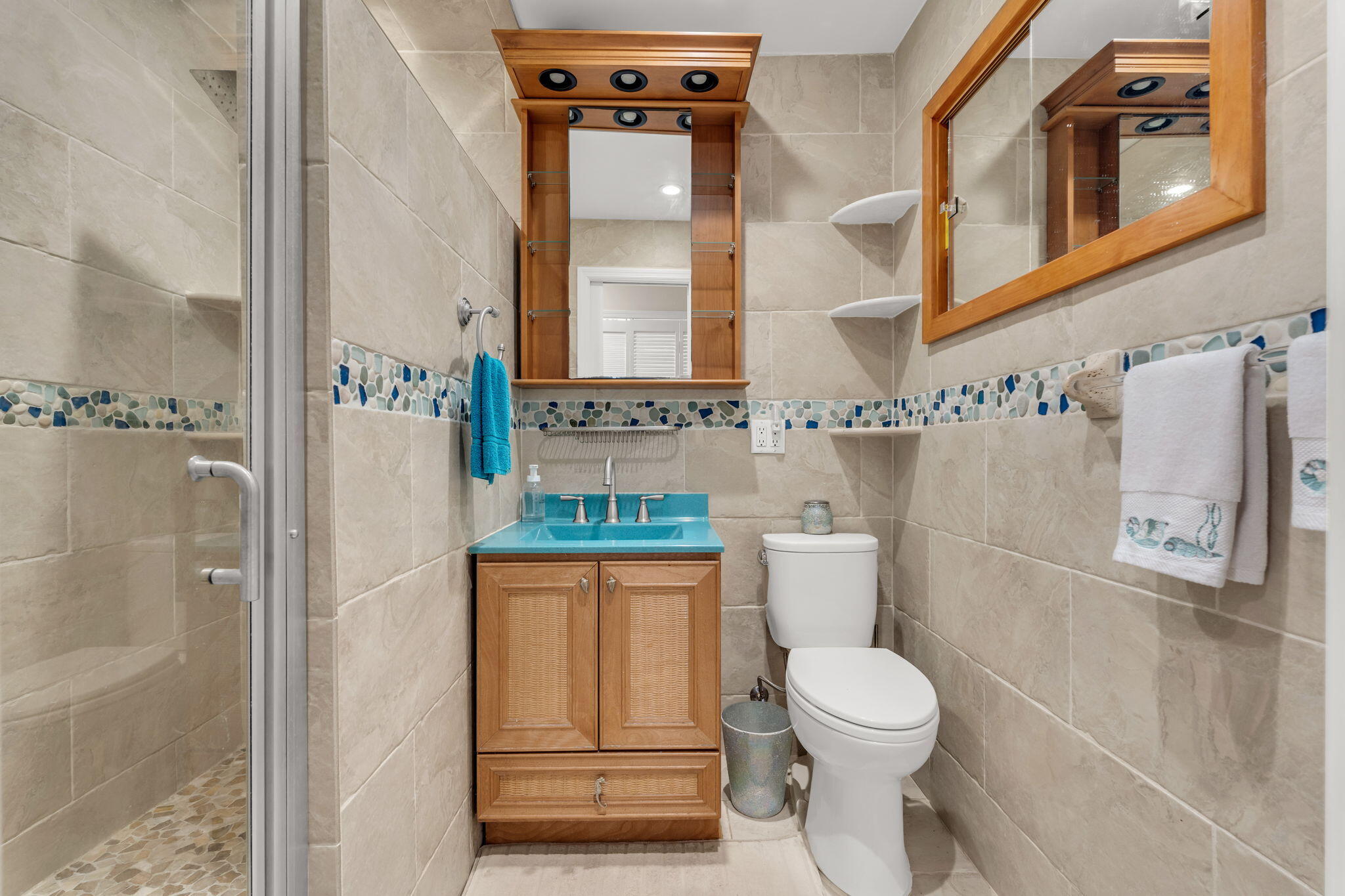 335 Sound Drive Key Largo, FL 33037 - Photo 22 of 45 a bathroom with a toilet sink and shower