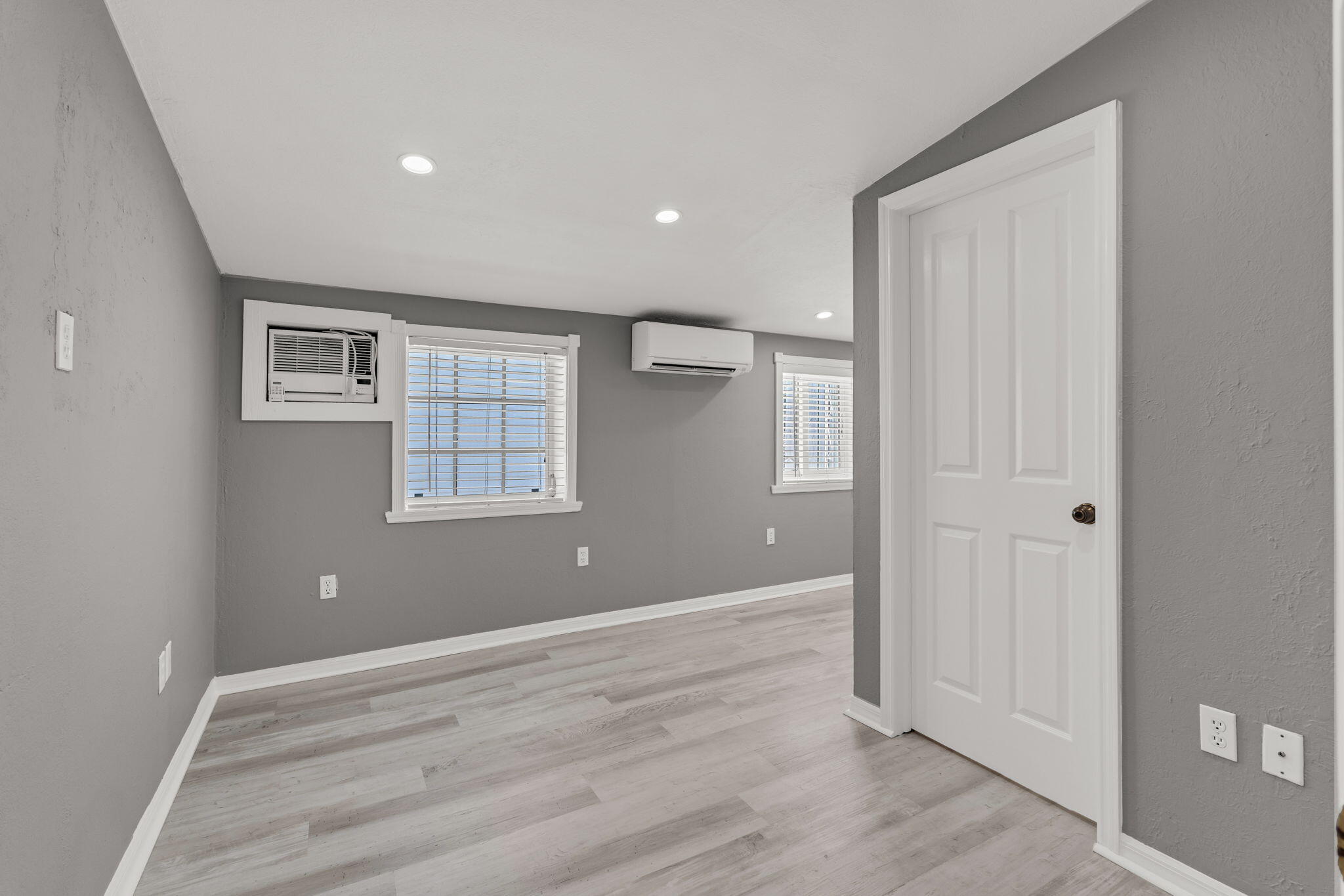 335 Sound Drive Key Largo, FL 33037 - Photo 26 of 45 a view of room with window and wooden floor