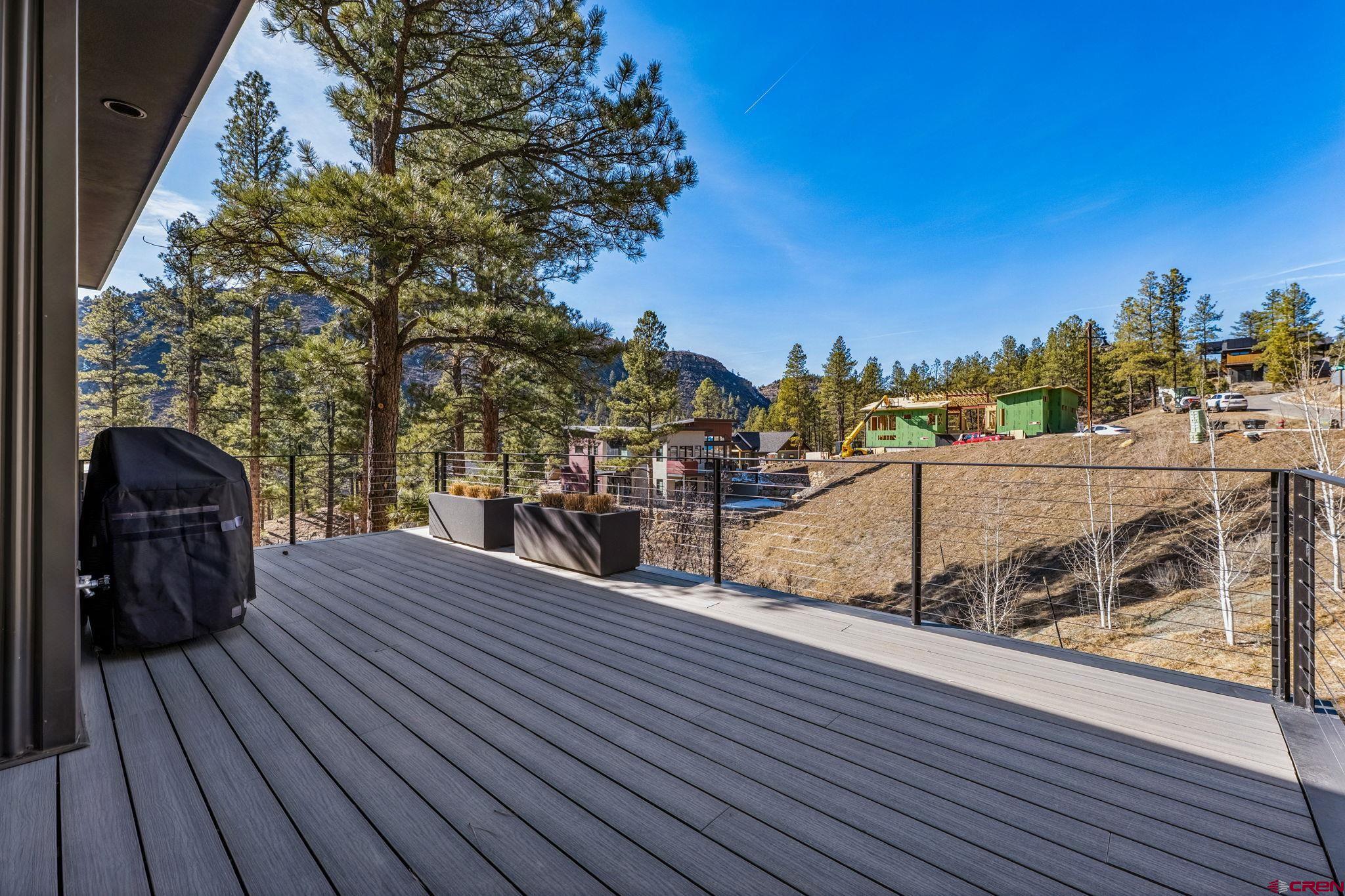 55 Bell Flower Court Durango, CO 81301 - Photo 36 of 44 a view of a balcony with wooden floor and outdoor space