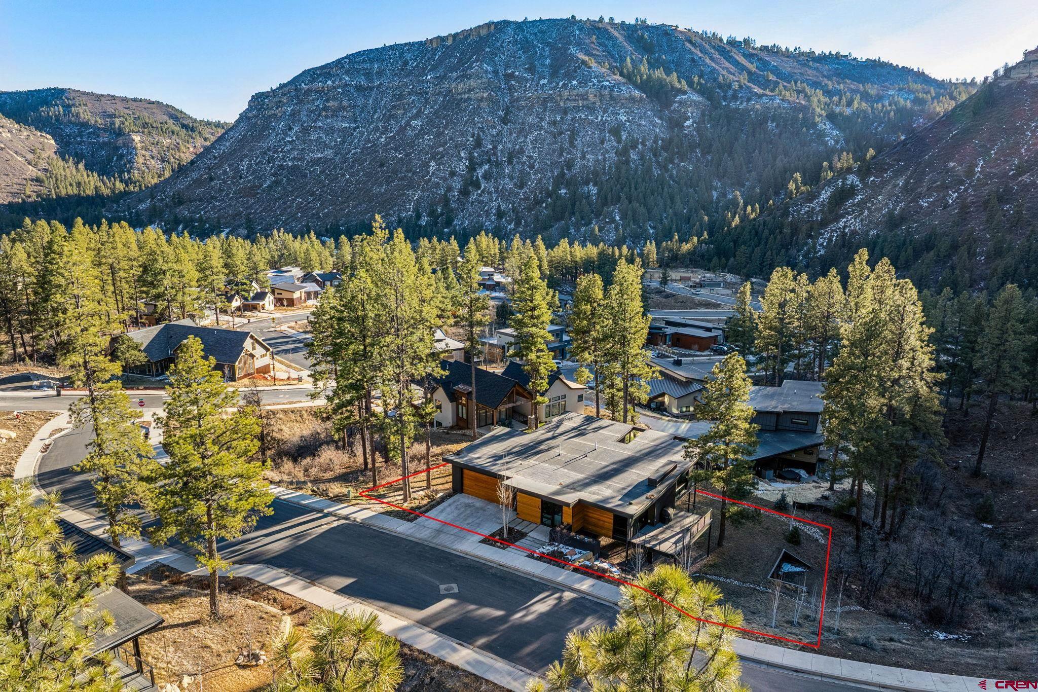 55 Bell Flower Court Durango, CO 81301 - Photo 42 of 44 an aerial view of a house with a yard