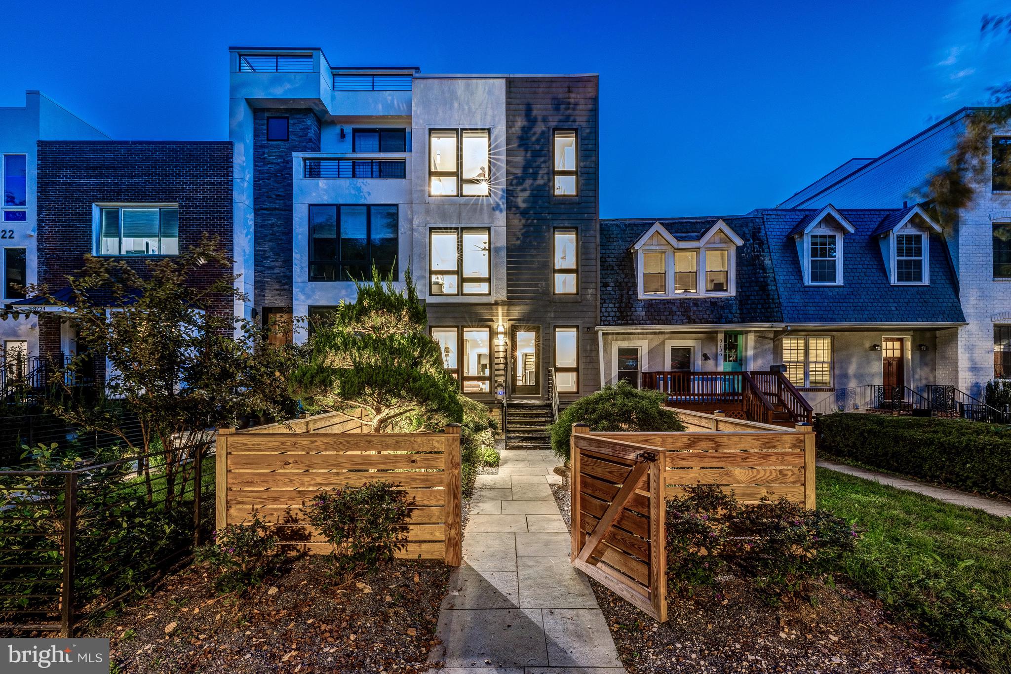 a view of a brick building with many windows