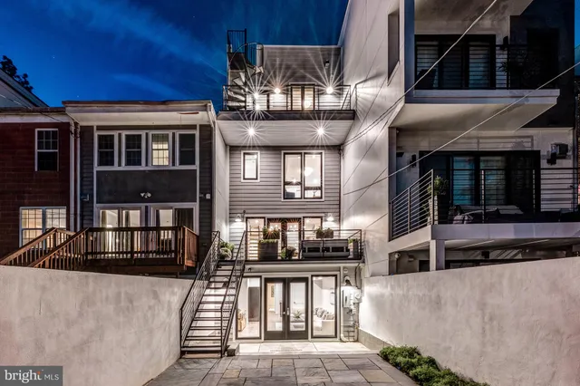 a view of a building with a street