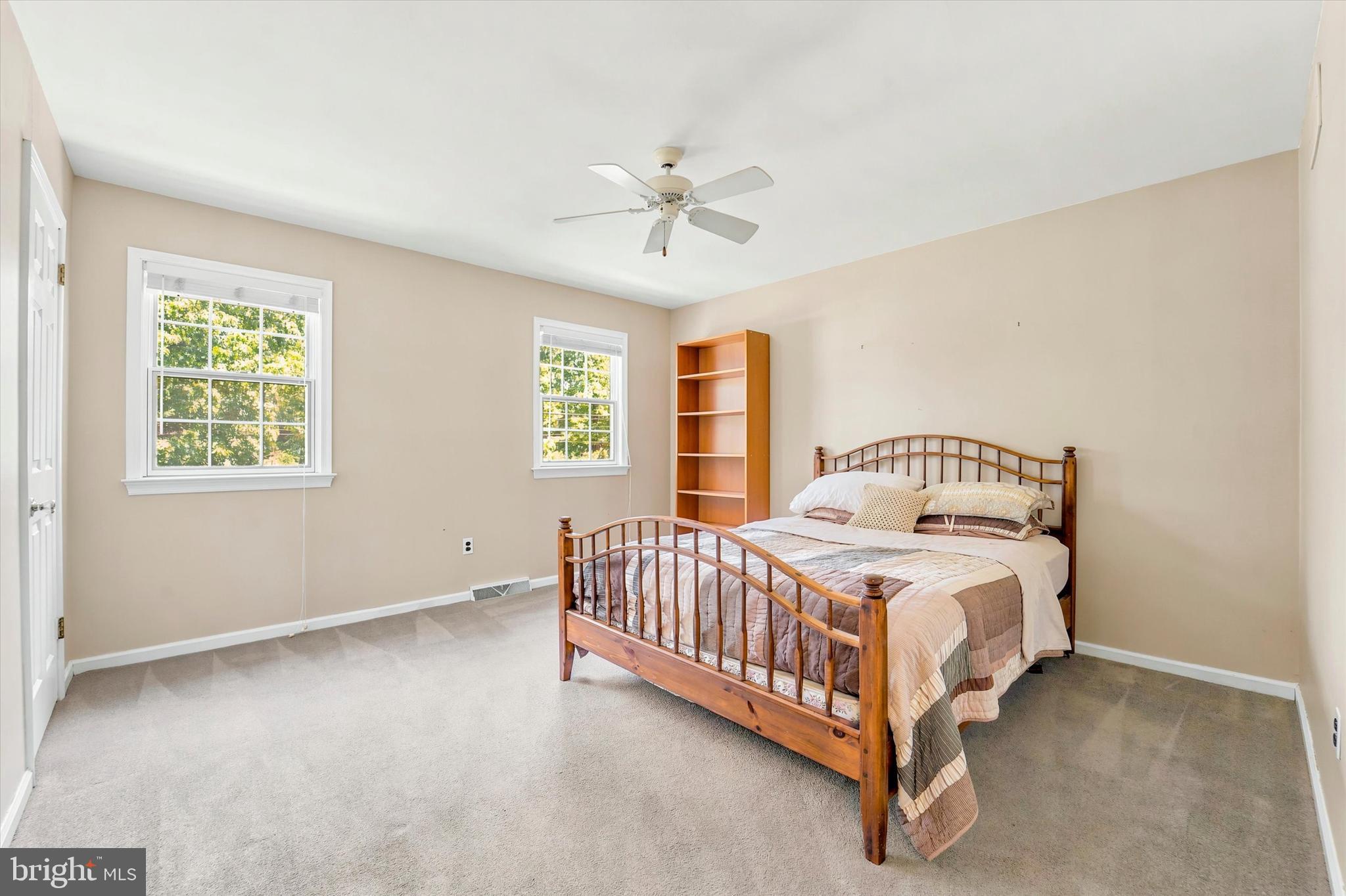 1980 Terwood Road Huntingdon Valley, PA 19006 - Photo 29 of 48 a bedroom with a bed rug and window