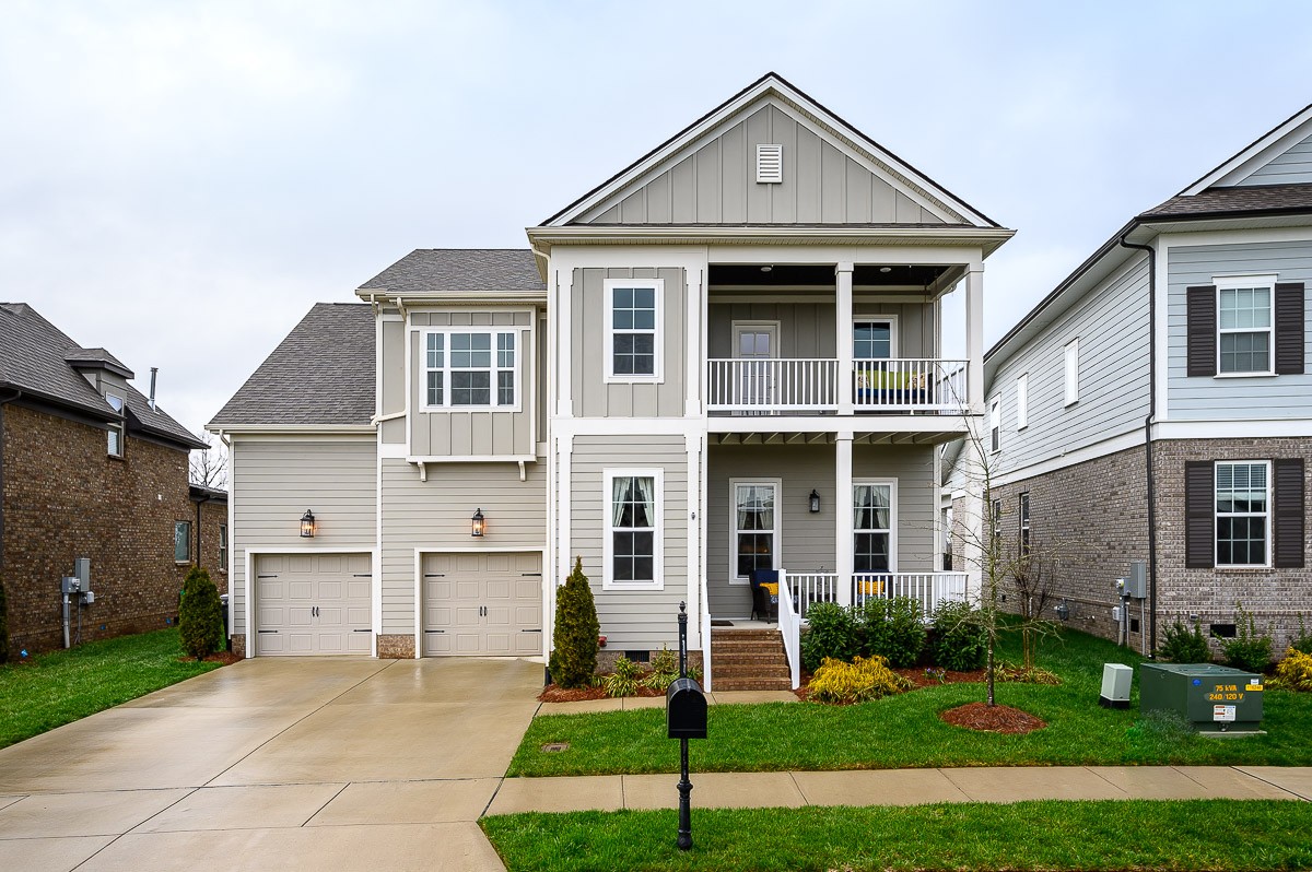 472 River Bluff Drive Franklin, TN 37064 - Photo 1 of 34 a front view of a house with a yard