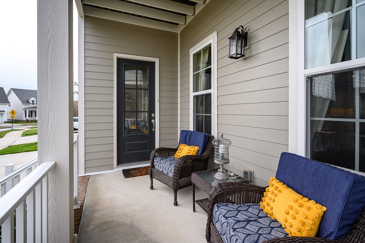 472 River Bluff Drive Franklin, TN 37064 - Photo 2 of 34 a backyard of a house with seating space