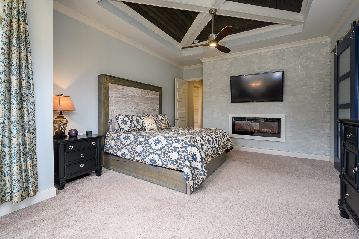 472 River Bluff Drive Franklin, TN 37064 - Photo 18 of 34 a bedroom with a bed and a flat screen tv