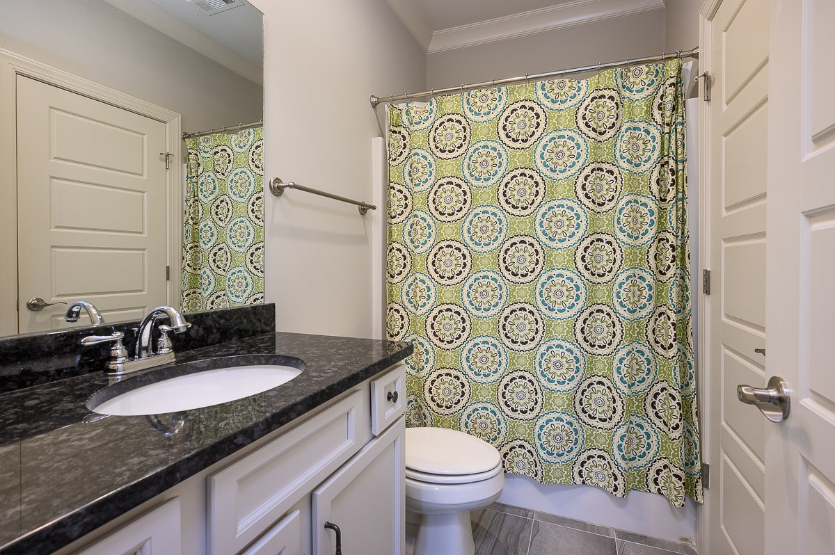 472 River Bluff Drive Franklin, TN 37064 - Photo 20 of 34 a bathroom with a granite countertop sink and a mirror