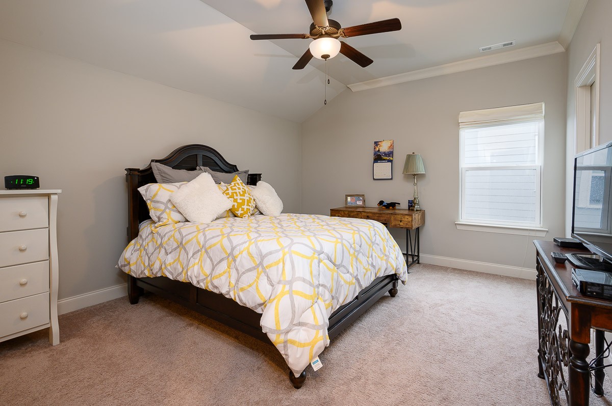 472 River Bluff Drive Franklin, TN 37064 - Photo 21 of 34 a bedroom with a bed and a window