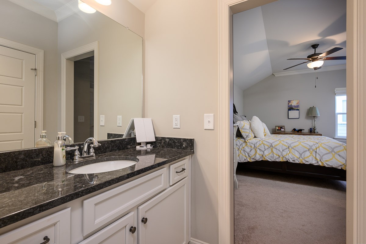 472 River Bluff Drive Franklin, TN 37064 - Photo 22 of 34 a bedroom with a bed and a double vanity