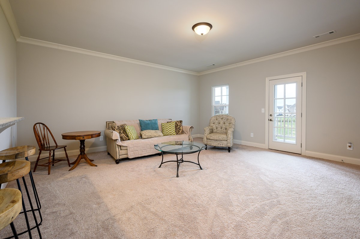 472 River Bluff Drive Franklin, TN 37064 - Photo 24 of 34 a living room with furniture and a window