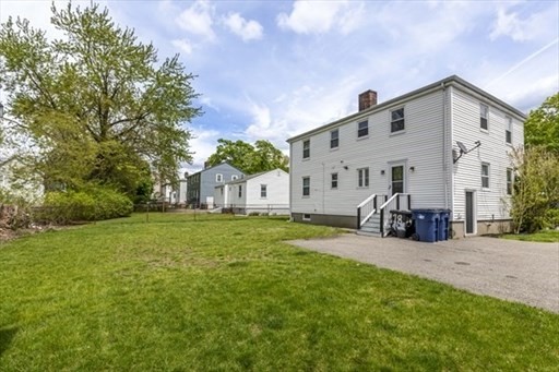 33 Paragon Road Boston, MA 02132 - Photo 2 of 8 a view of a house with backyard and sitting area