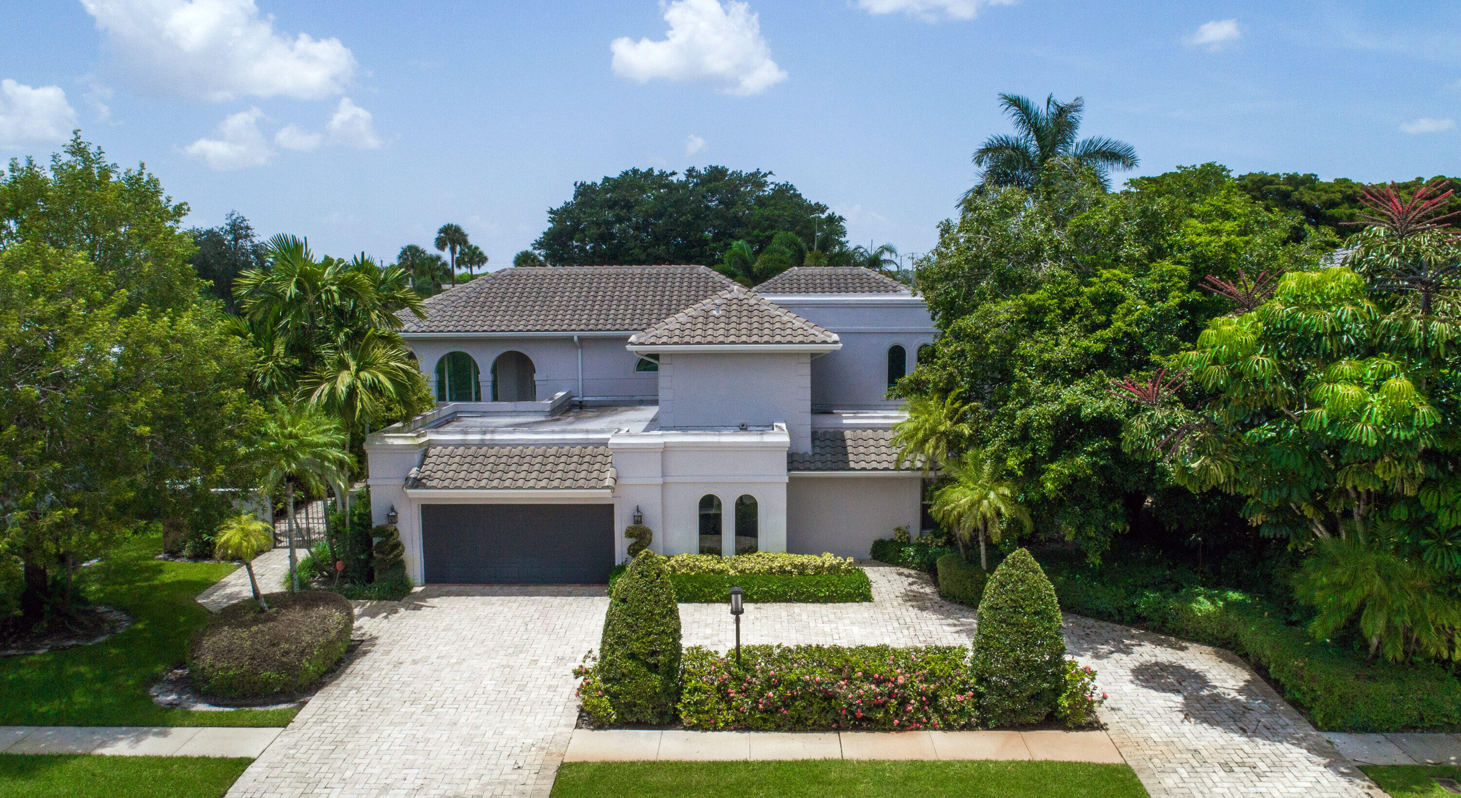 7972 Mandarin Drive Boca Raton, FL 33433 - Photo 1 of 1 a front view of a house with a yard