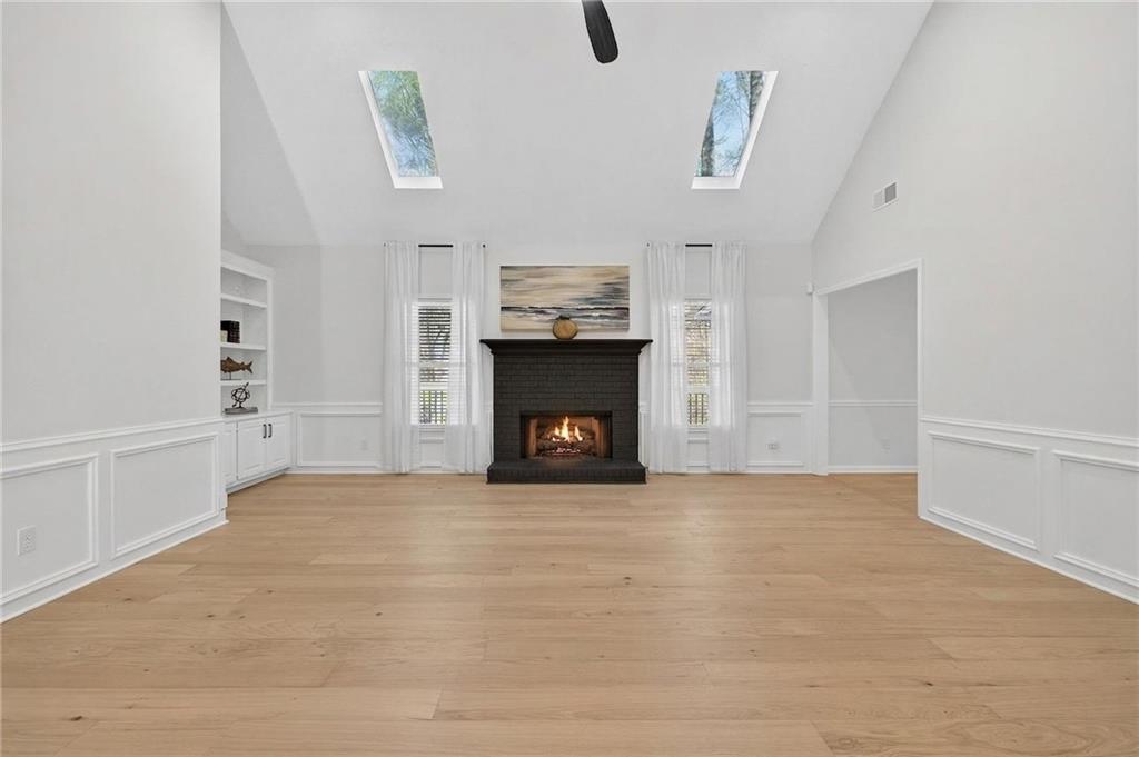 601 Cobblestone Lane Stone Mountain, GA 30087 - Photo 11 of 69 a view of an empty room with a fireplace