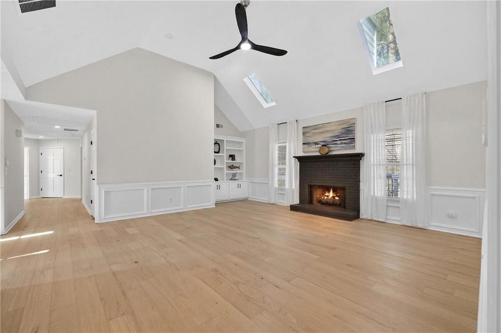 601 Cobblestone Lane Stone Mountain, GA 30087 - Photo 12 of 69 a view of an empty room with fire place and a fireplace