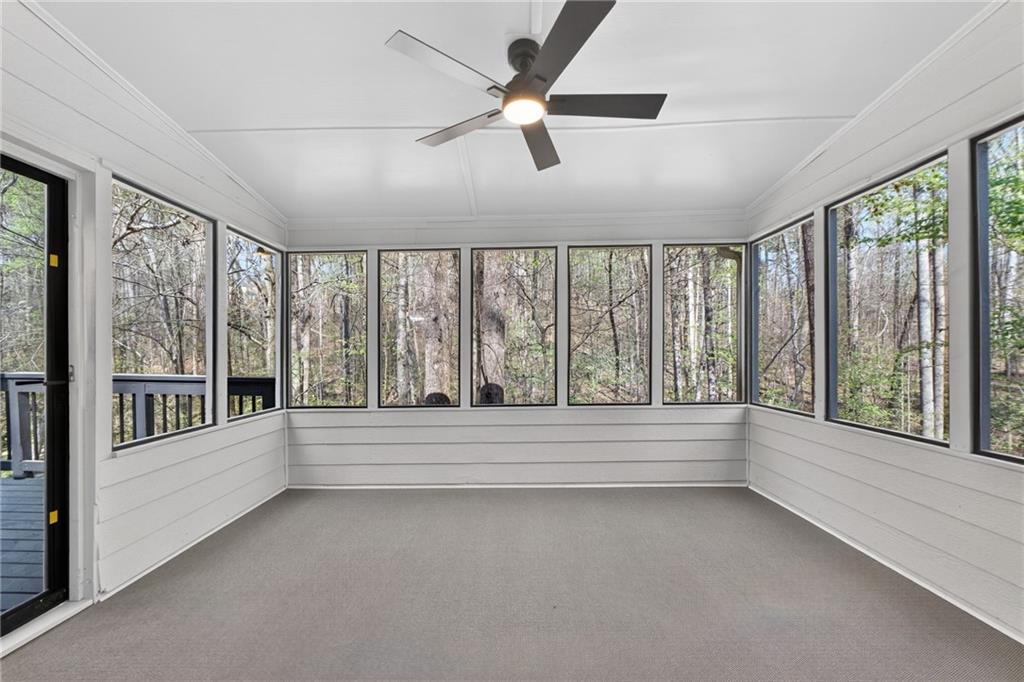 601 Cobblestone Lane Stone Mountain, GA 30087 - Photo 27 of 69 a view of room with window and a ceiling fan