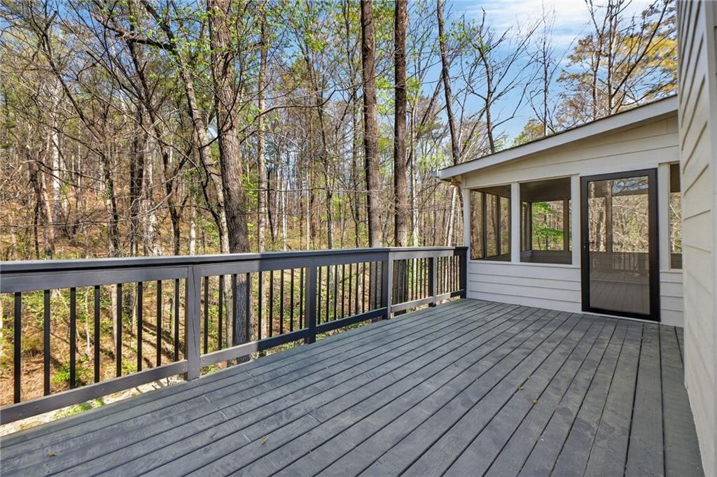 601 Cobblestone Lane Stone Mountain, GA 30087 - Photo 30 of 69 a view of backyard with deck and wooden floor