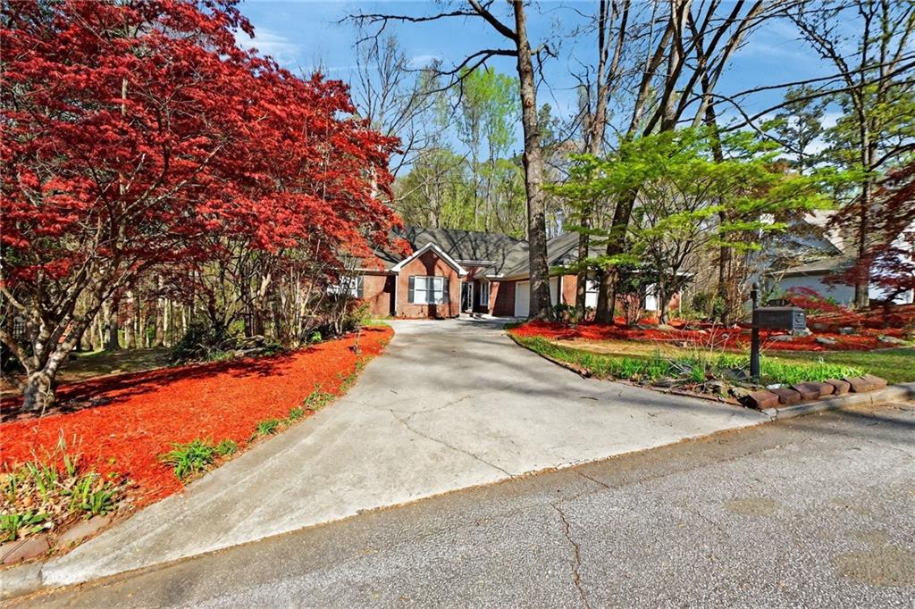 601 Cobblestone Lane Stone Mountain, GA 30087 - Photo 3 of 69 a view of street with houses on both side