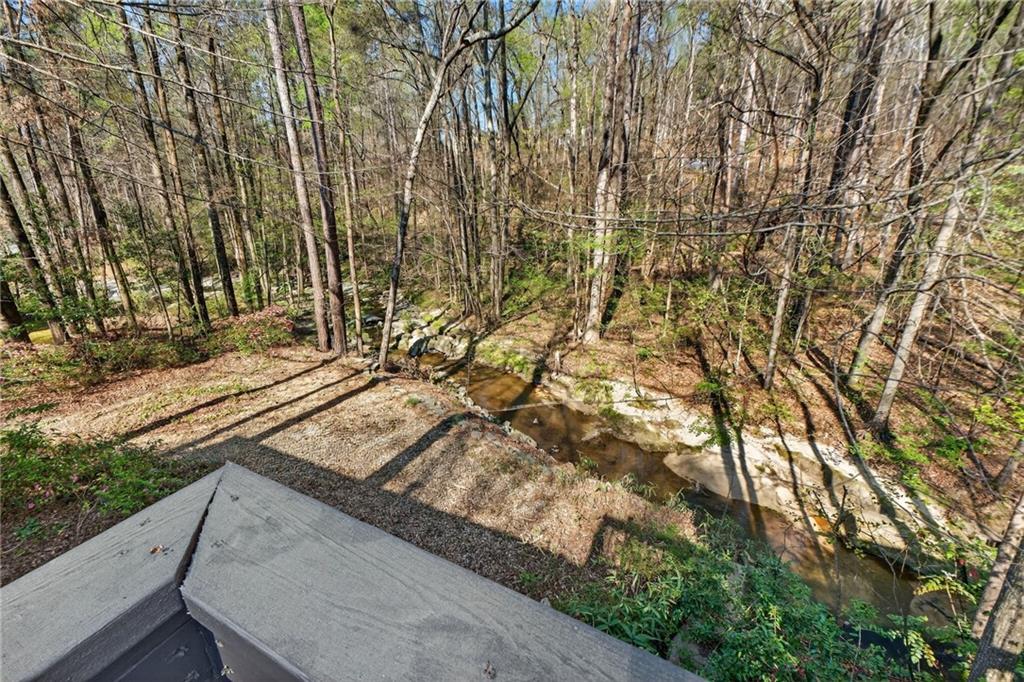 601 Cobblestone Lane Stone Mountain, GA 30087 - Photo 31 of 69 a view of a yard with wooden fence