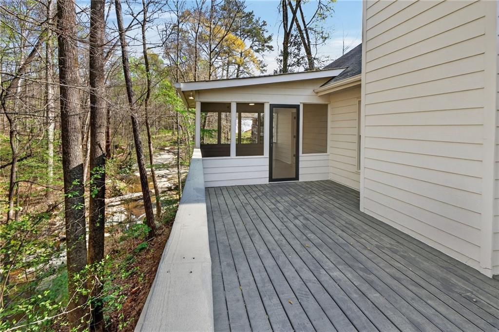 601 Cobblestone Lane Stone Mountain, GA 30087 - Photo 32 of 69 a view of a house with a deck