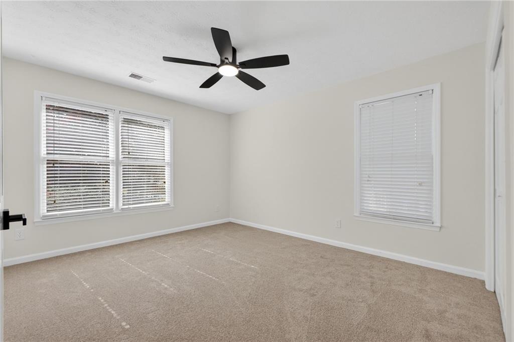 601 Cobblestone Lane Stone Mountain, GA 30087 - Photo 40 of 69 a view of an empty room with a window