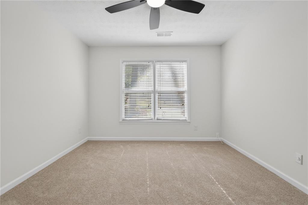 601 Cobblestone Lane Stone Mountain, GA 30087 - Photo 45 of 69 an empty room with a window