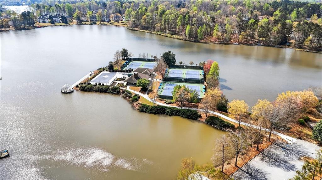 601 Cobblestone Lane Stone Mountain, GA 30087 - Photo 69 of 69 a view of a lake with boats and trees in the background
