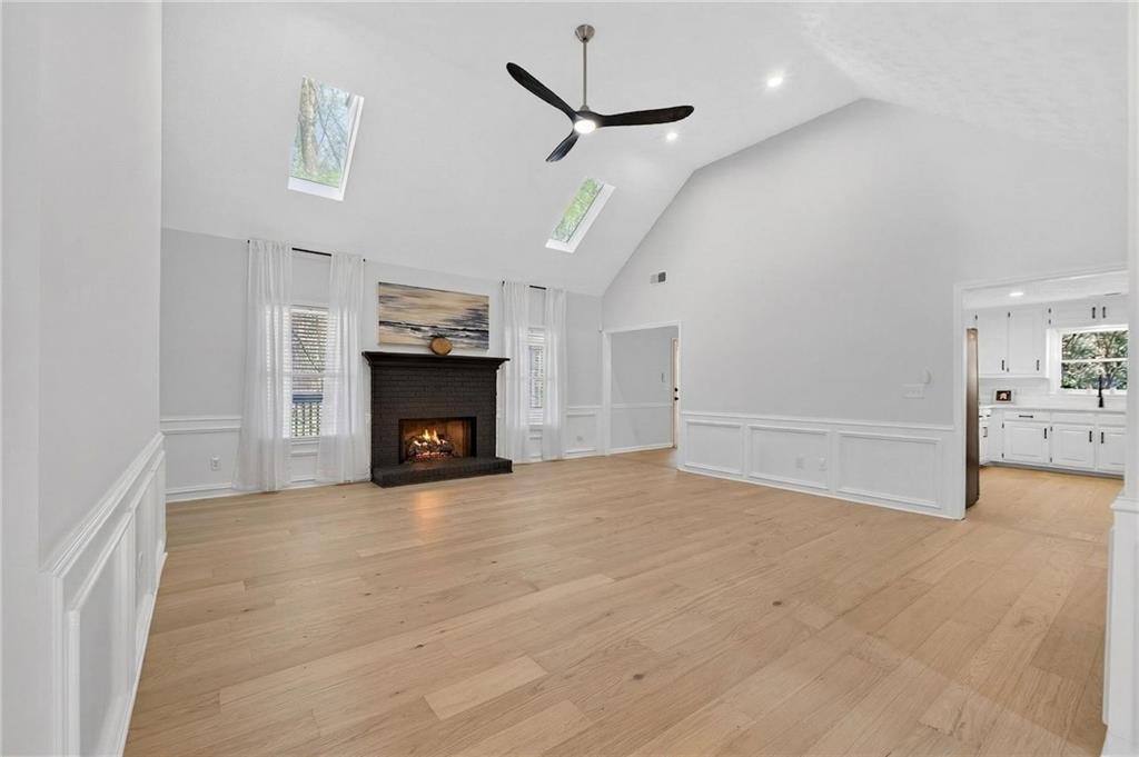 601 Cobblestone Lane Stone Mountain, GA 30087 - Photo 10 of 69 a view of an empty room and fire place