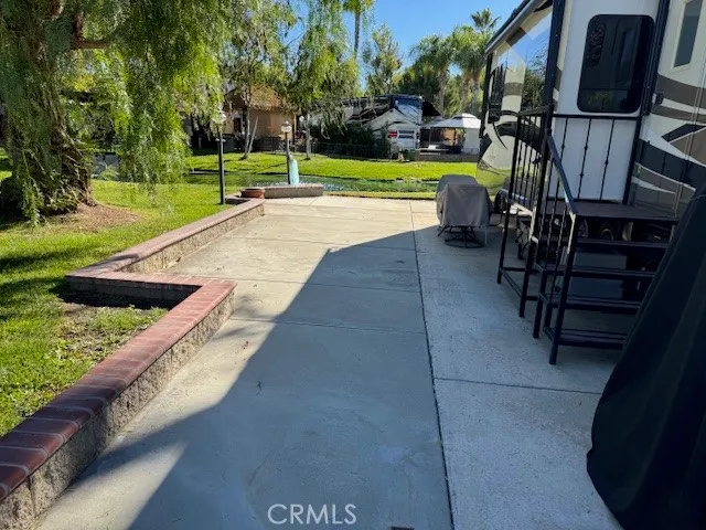 a view of swimming pool with yard